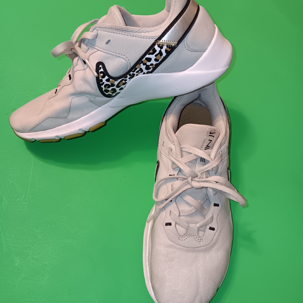 Nike Women’s White Running Shoes with Leopard Swoosh